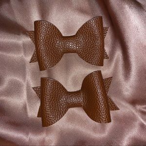 NWOT Faux Leather Bows